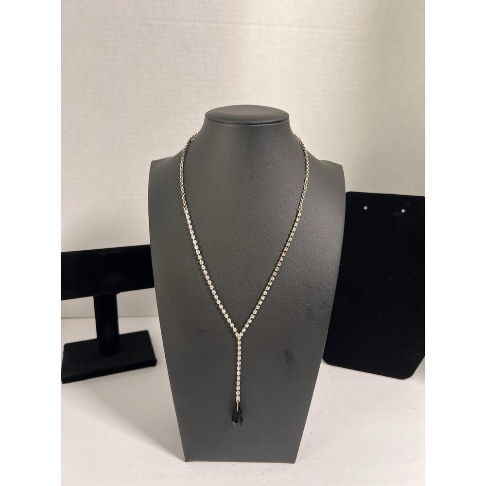 Y-drop necklace featuring a silver-tone rhinestone chain